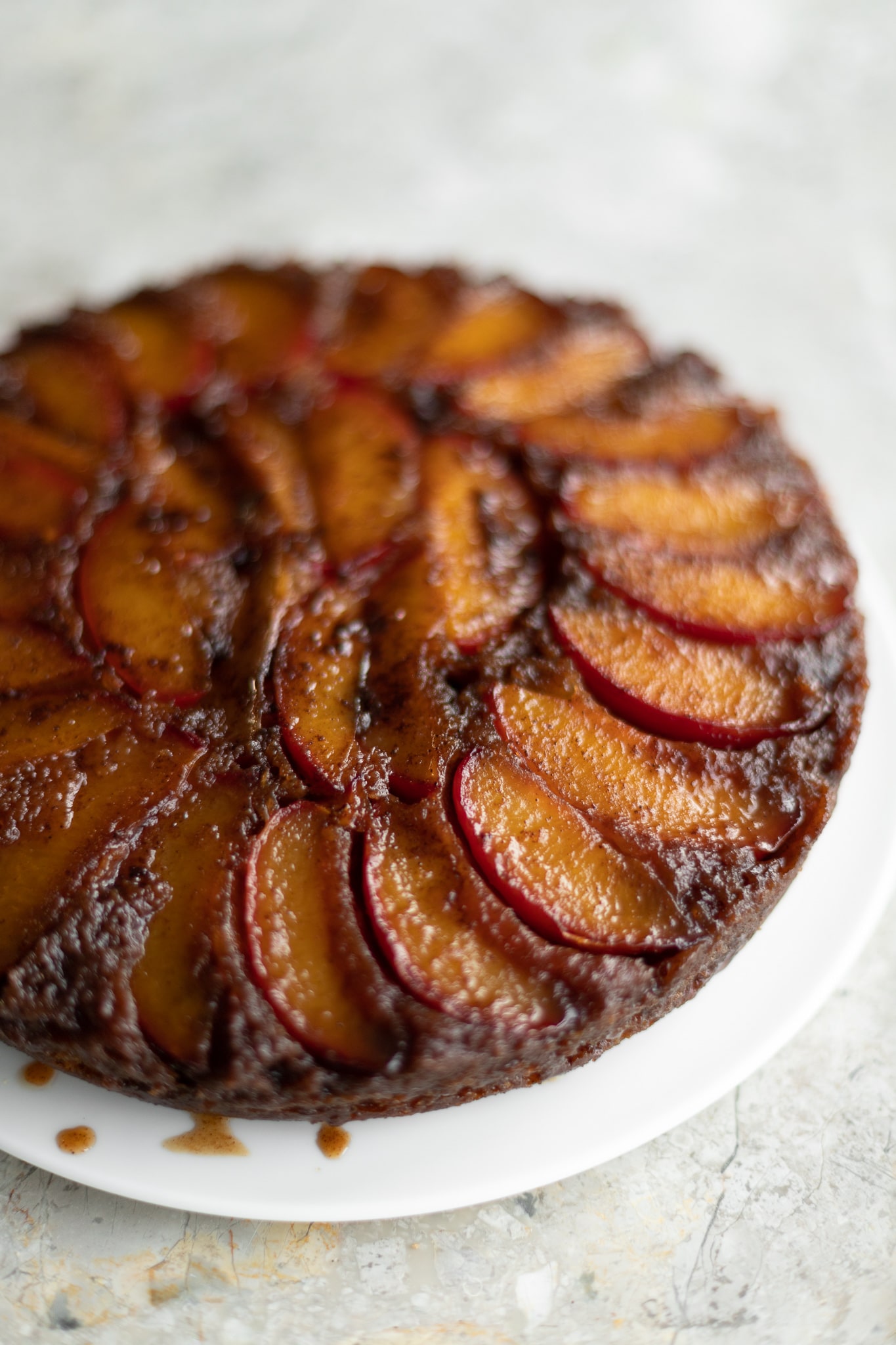 plum upside down cake, shot from the side