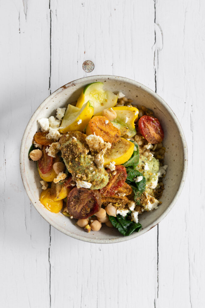 grain bowl with lots of tomatoes