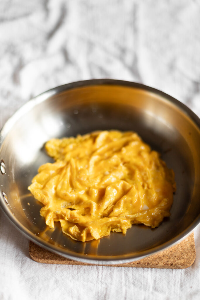 eggs in a stainless steel skillet