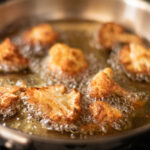 cauliflower frying in oil